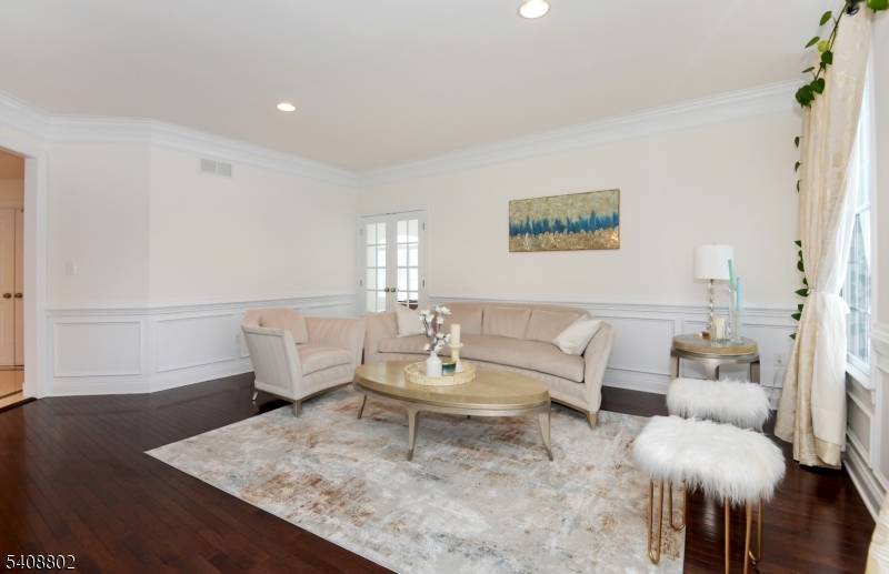 10 Raker Court Hillsborough, NJ 08844 - Photo 6 of 44 a living room with furniture and a table