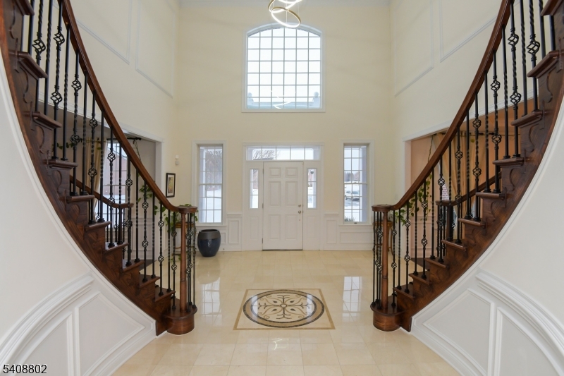 10 Raker Court Hillsborough, NJ 08844 - Photo 9 of 44 a view of entryway and hall with wooden floor