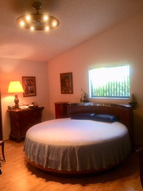 Master bedroom with vaulted ceilings