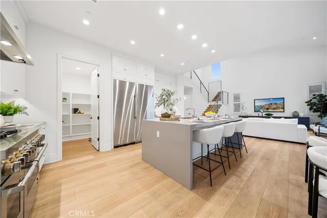 a view of house with outdoor seating and city view