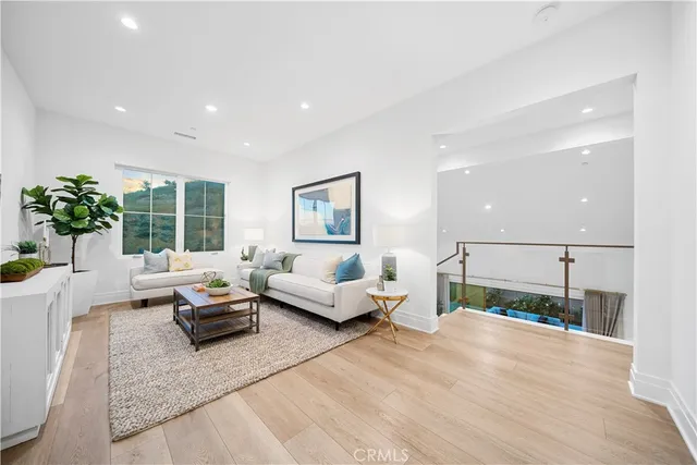 a view of a balcony with wooden floor