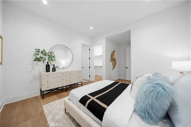 a bathroom with a shower sink and mirror
