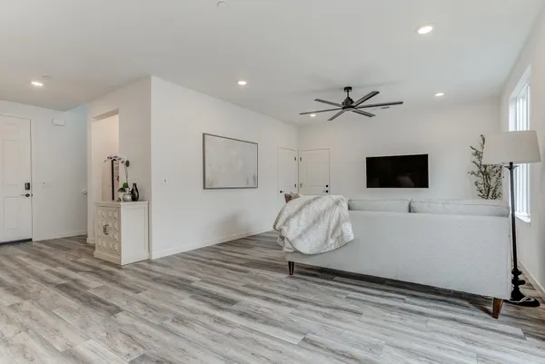 a view of a livingroom with wooden floor