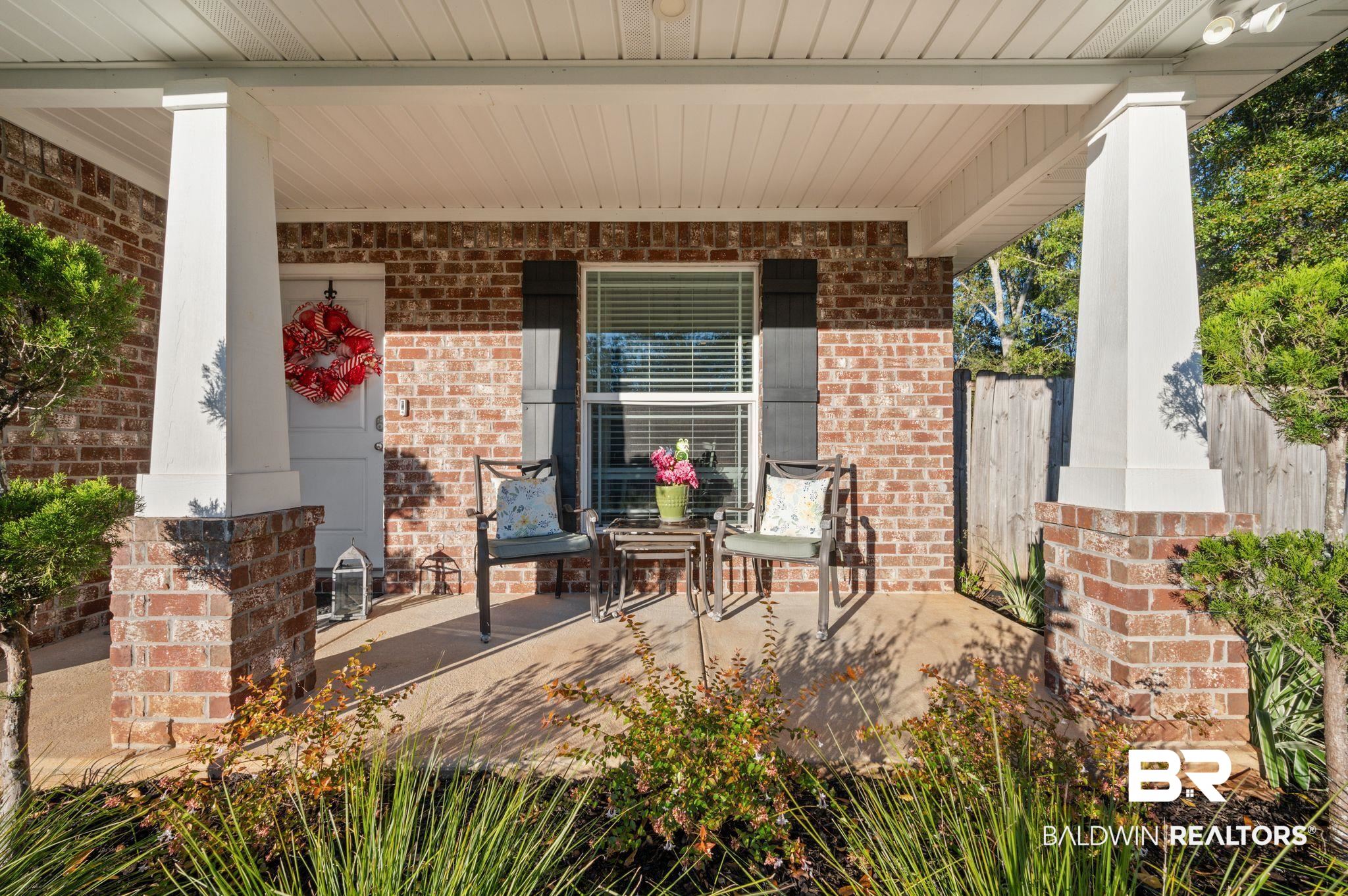 9366 Fox Run Court Semmes, AL 36575 - Photo 5 of 29 View of patio / terrace featuring a porch