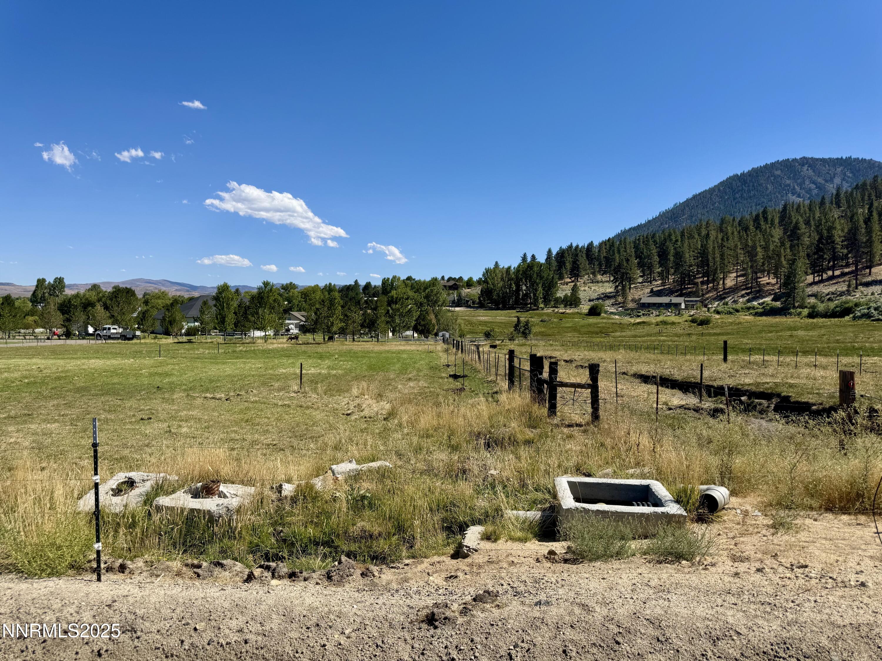 565 Jackson Ranch Road Gardnerville, NV 89460 - Photo 8 of 13 a view of a lake with houses