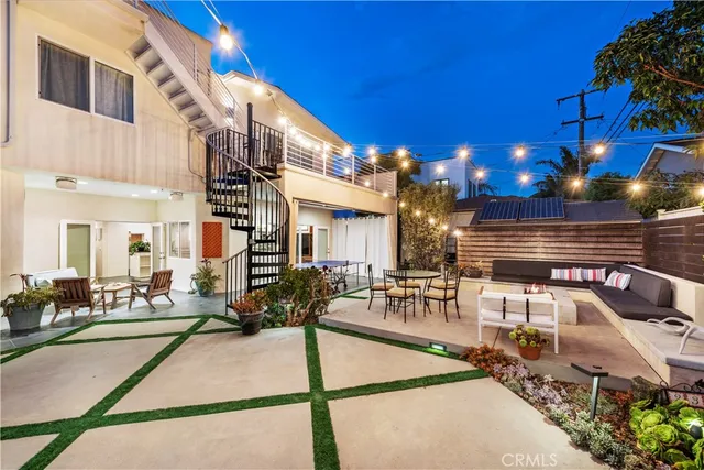 a view of a patio with swimming pool table and chairs