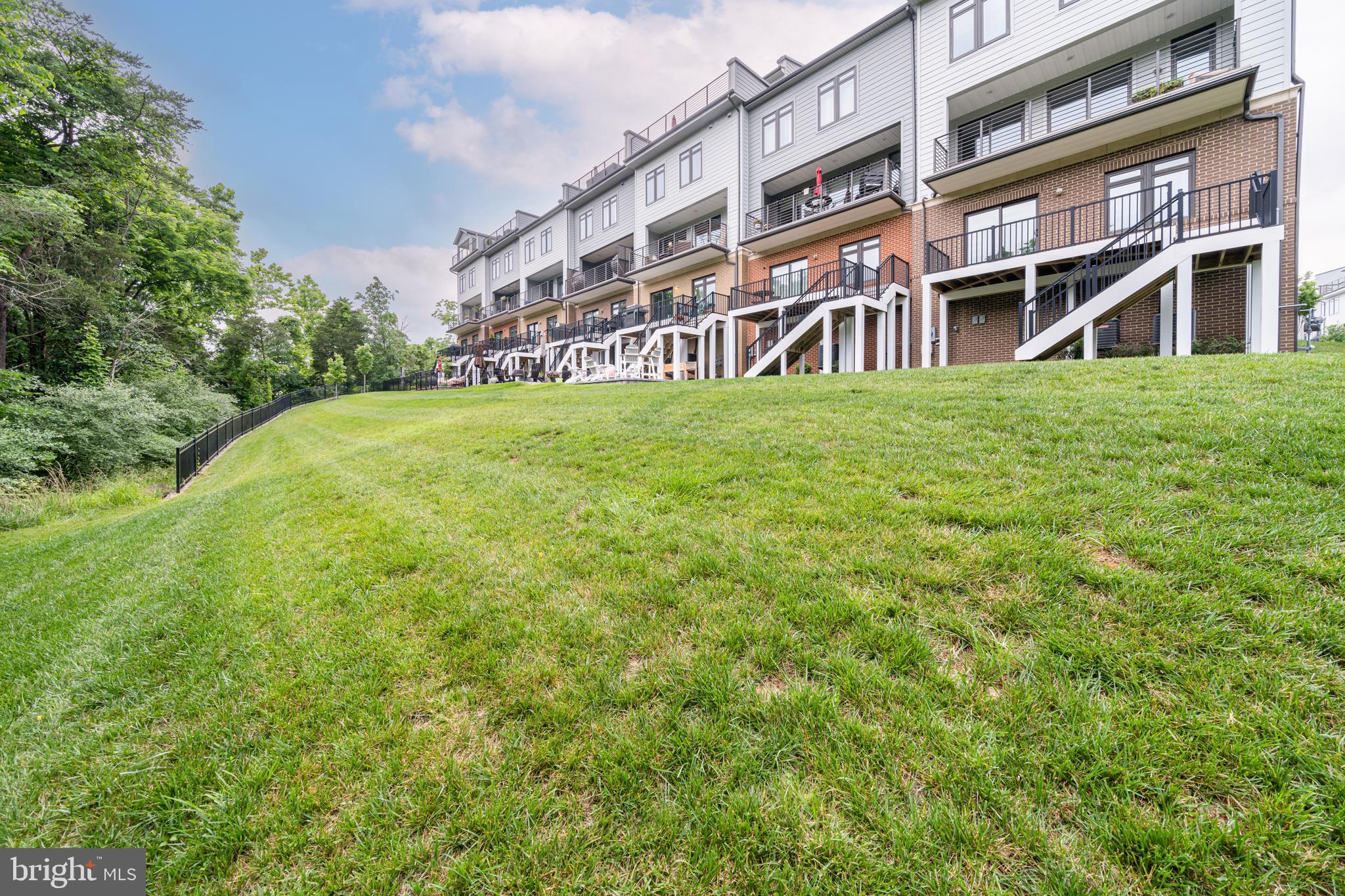 1521 Ribbon Limestone Terrace Southeast Leesburg, VA 20175 - Photo 5 of 34 a building with garden view