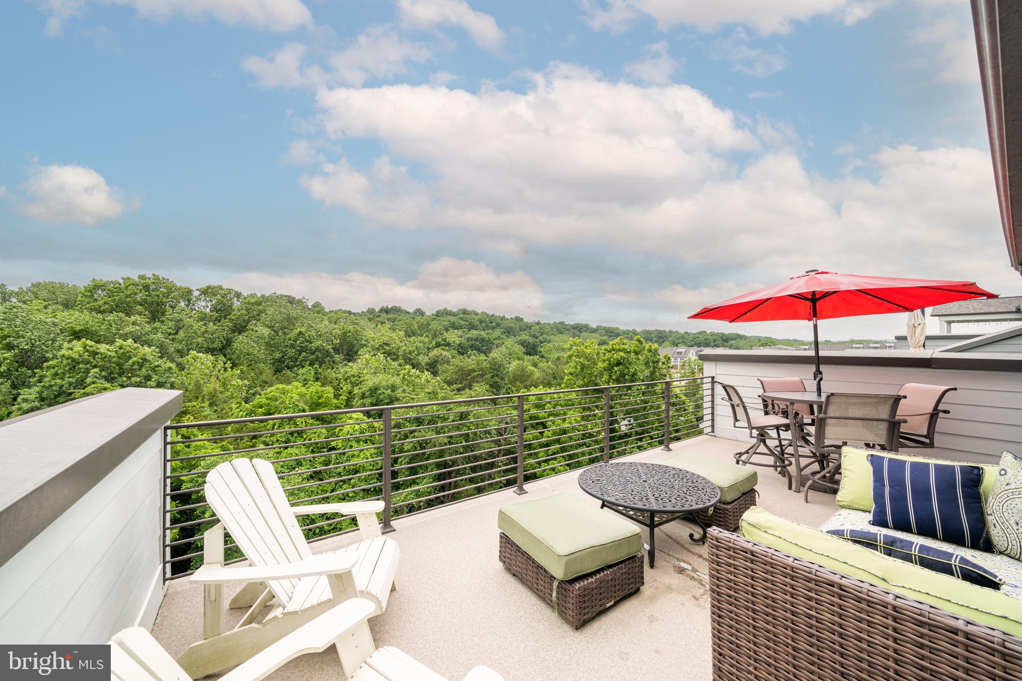 1521 Ribbon Limestone Terrace Southeast Leesburg, VA 20175 - Photo 7 of 34 an outdoor sitting area with furniture