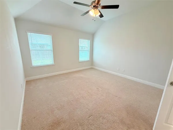 a kitchen with stainless steel appliances granite countertop a sink stove and microwave