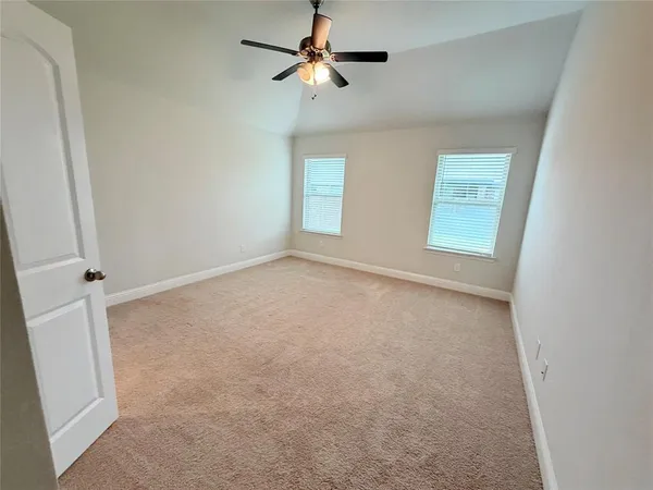 a bathroom with a bathtub sink and mirror