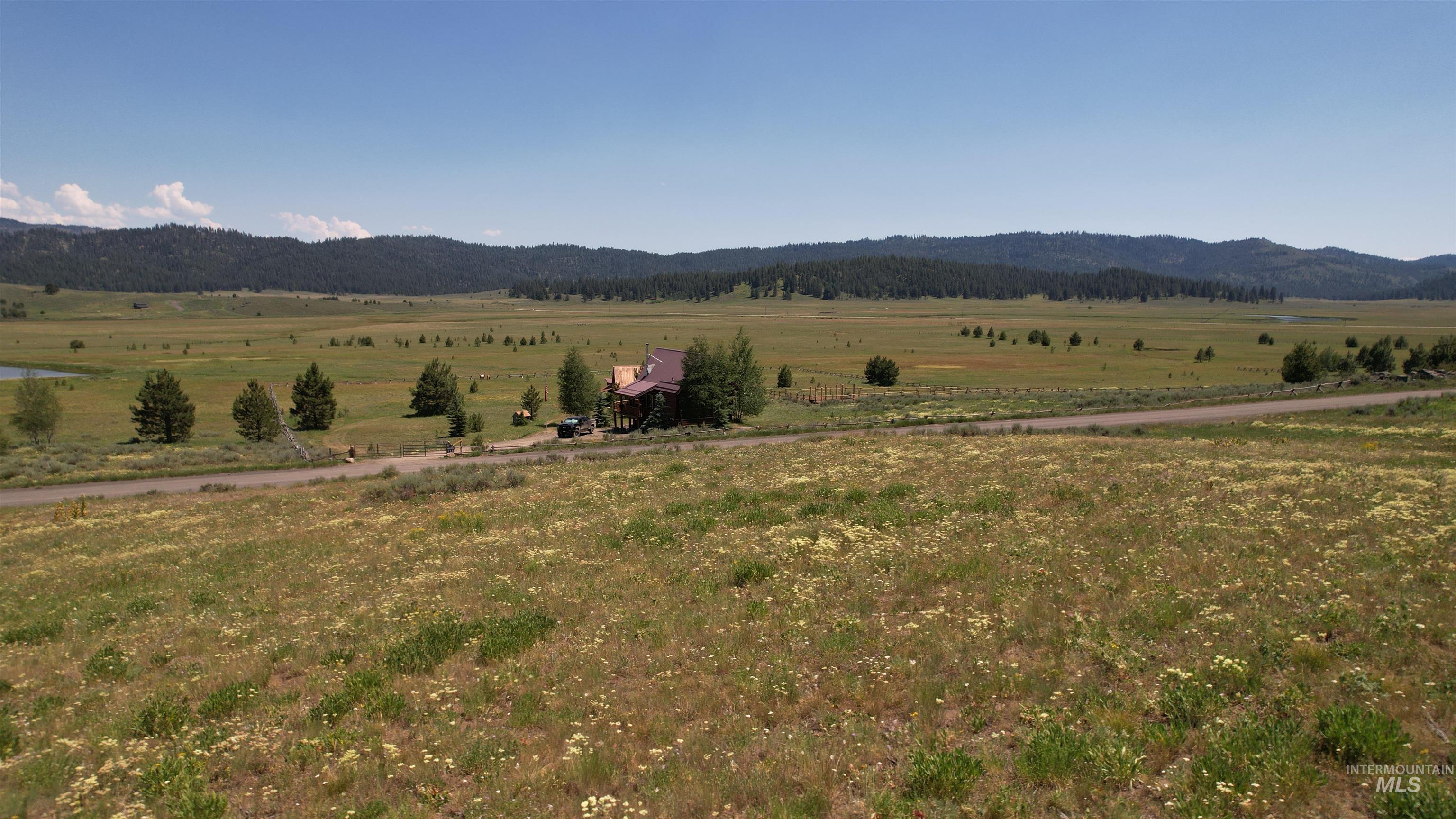 Lot 7 Wilderness Ranch Lane Cascade, ID 83611 - Photo 21 of 46 View of mountain background with rural landscape and agricultural land