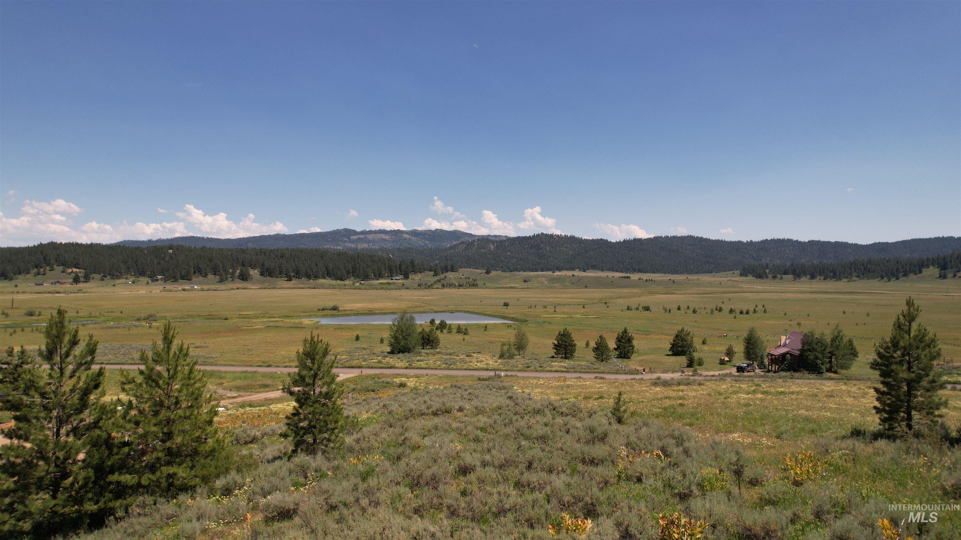 Lot 7 Wilderness Ranch Lane Cascade, ID 83611 - Photo 25 of 46 View of mountain backdrop with rural landscape