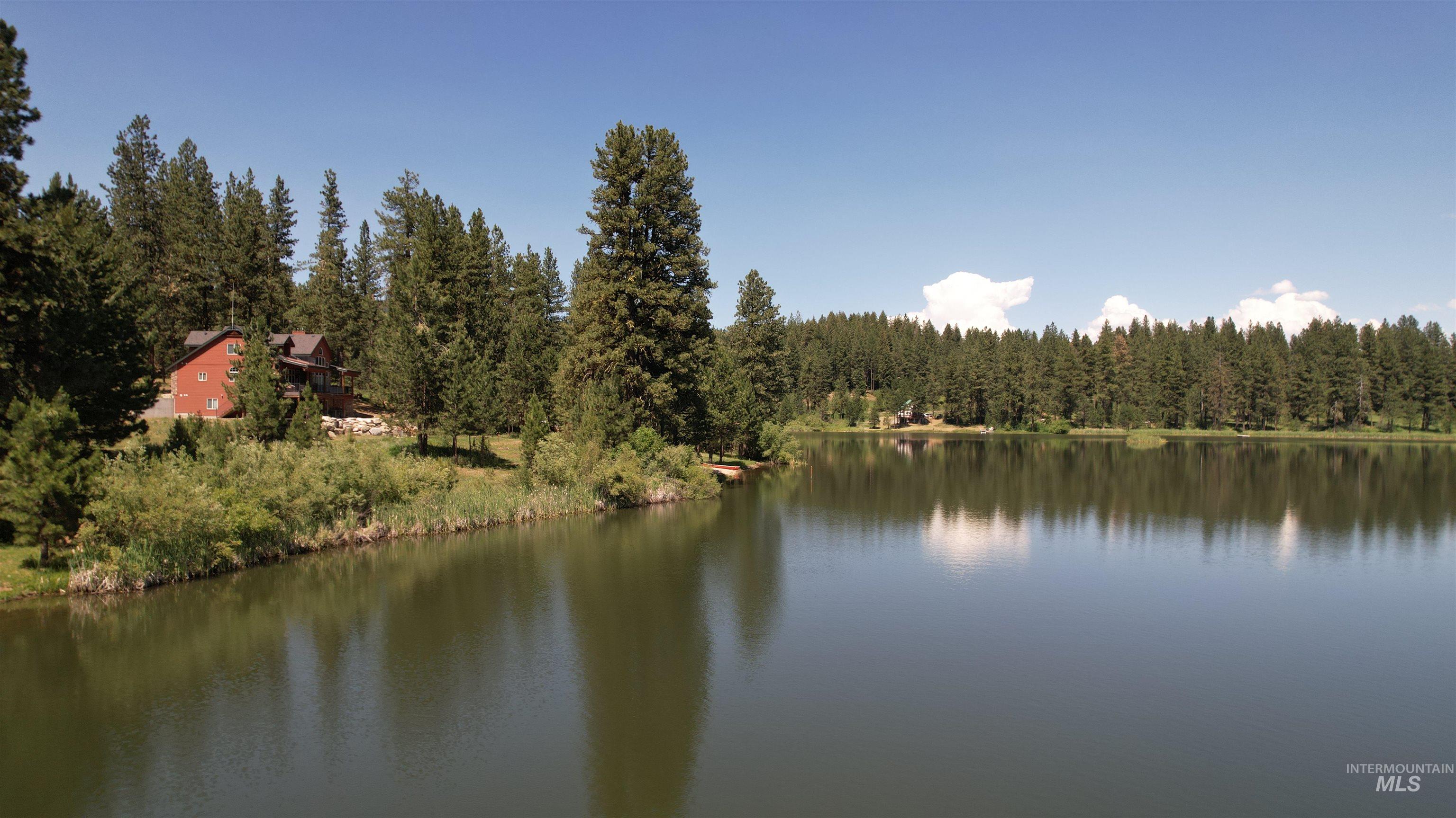 Lot 7 Wilderness Ranch Lane Cascade, ID 83611 - Photo 30 of 46 Water view with a heavily wooded area
