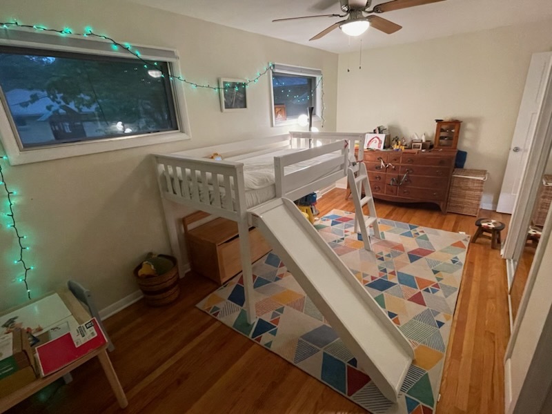 1008 Broadmoor Drive Champaign, IL 61821 - Photo 7 of 8 a living room with furniture and a flat screen tv