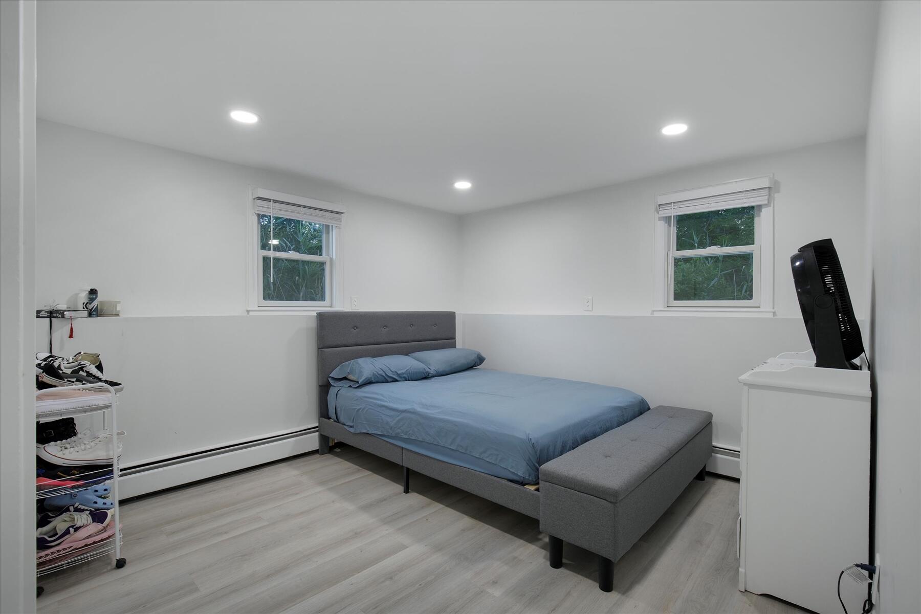 65 Marsh Lane Hyannis, MA 02601 - Photo 16 of 22 a bedroom with furniture and a window