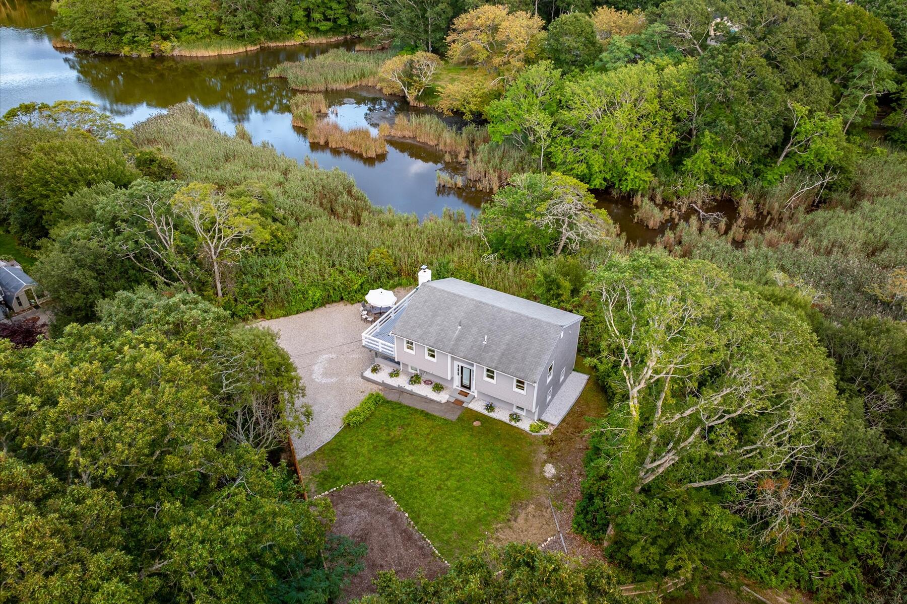 65 Marsh Lane Hyannis, MA 02601 - Photo 22 of 22 an aerial view of a house with a yard