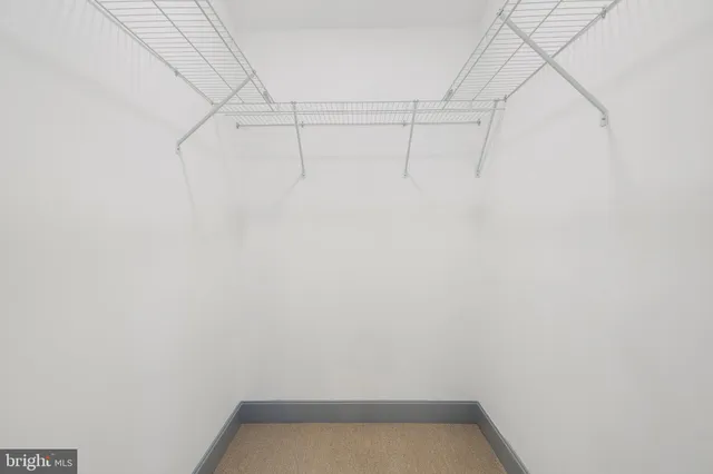 a view of a room with racks on the wall