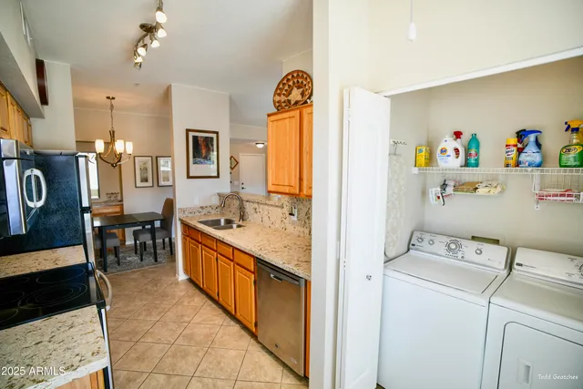 a spacious bathroom with a granite countertop sink a mirror and a shower