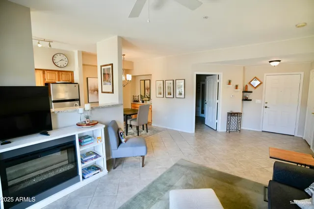 a living room with furniture and a window