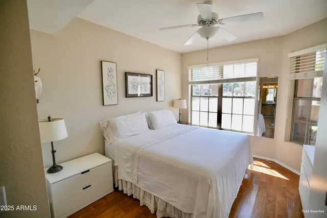 a bedroom with a bed and a view of bathroom