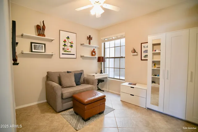 a living room with furniture and decor