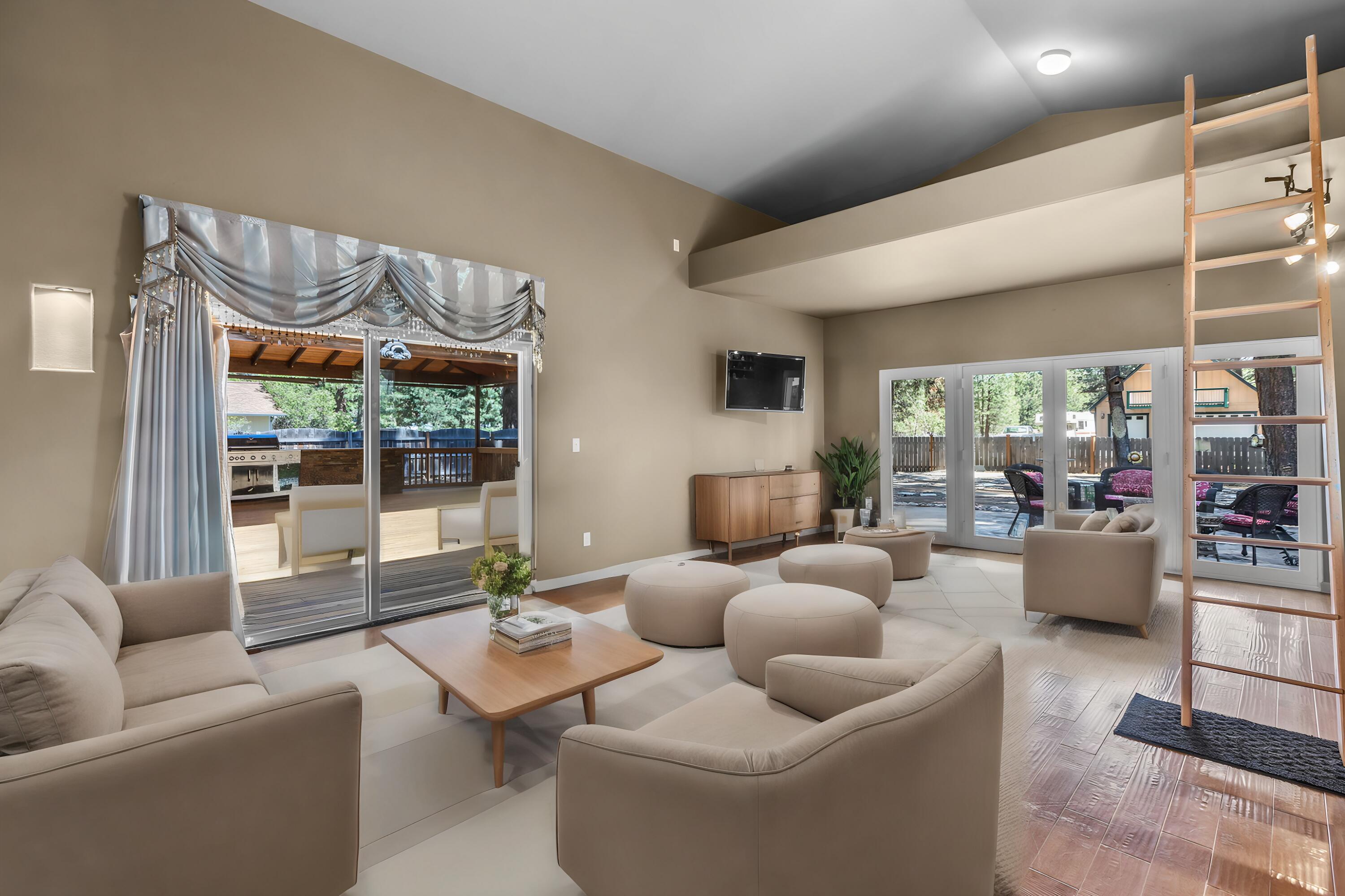 59842 Navajo Road Bend, OR 97702 - Photo 14 of 52 a living room with furniture and a large window