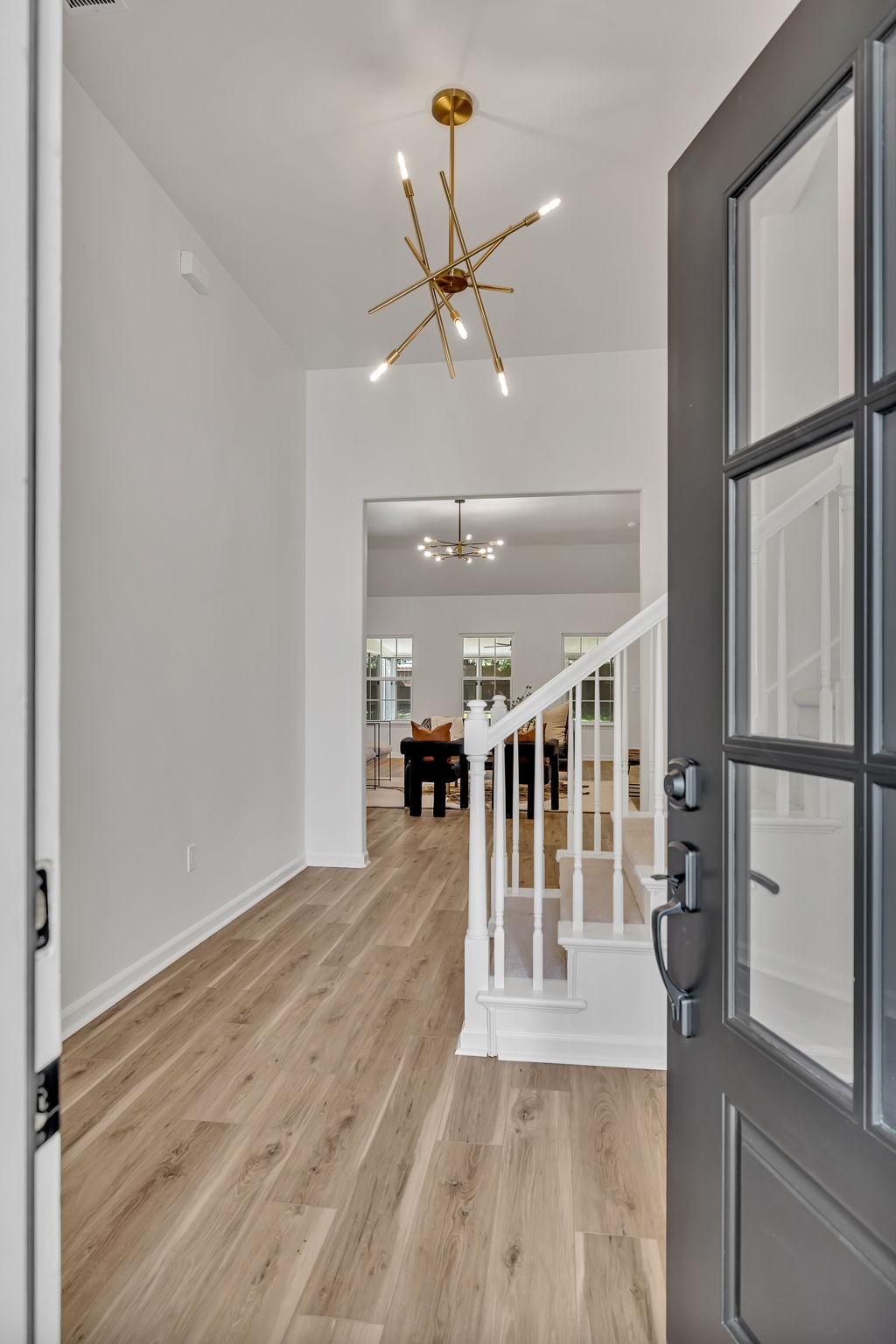 1601 Inverness Drive Spring Hill, TN 37174 - Photo 8 of 58 As you enter the home, you will be greeted by vaulted ceilings, modern light fixtures and open concept living space.
