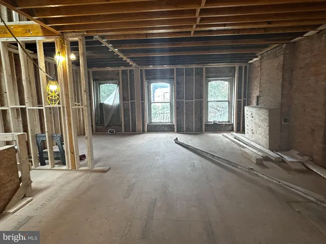 a view of livingroom with furniture and windows