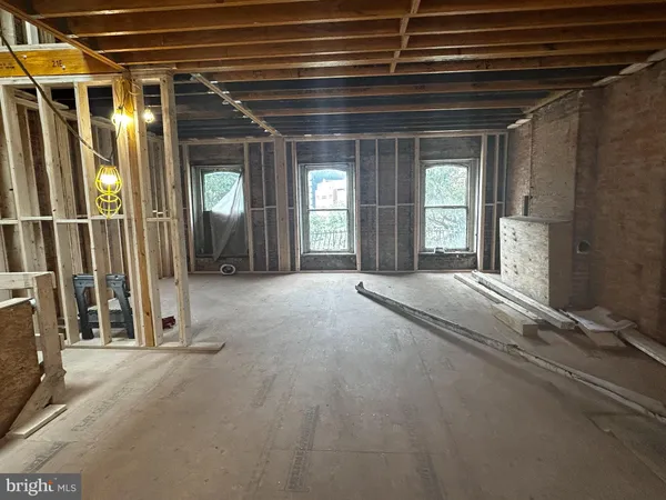 a view of livingroom with furniture and windows