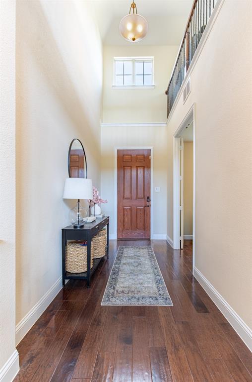 717 Rio Concho Trail McKinney, TX 75071 - Photo 3 of 37 Entry with soaring ceilings and balcony from 2nd story.