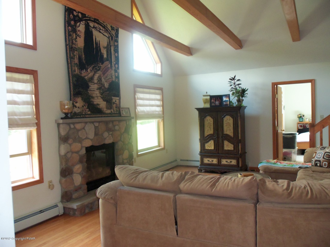 116 Granite Road Long Pond, PA 18334 - Photo 4 of 28 a living room with furniture and a fireplace