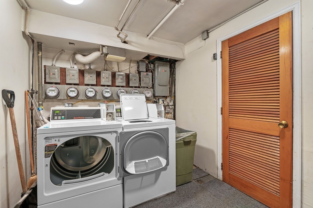 121 Cambridge Road, Unit 2 Woburn, MA 01801 - Photo 21 of 23 a utility room with dryer and washer