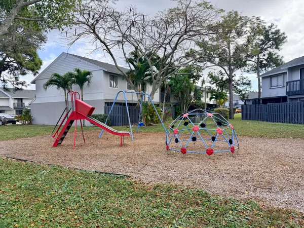 a view of play ground and a fountain