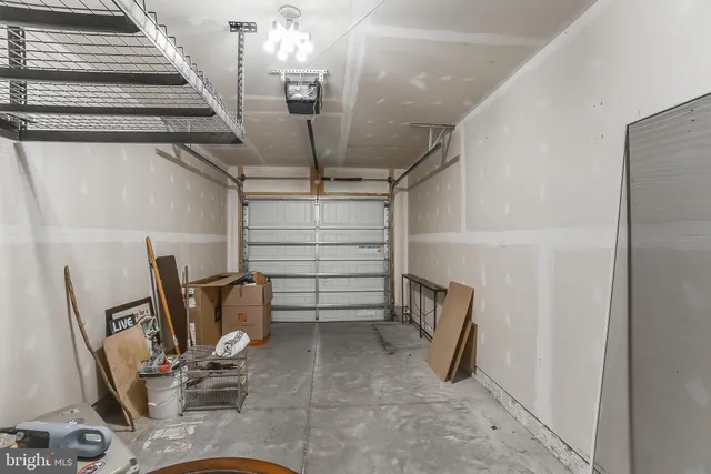 a backyard of a house with yard and outdoor seating