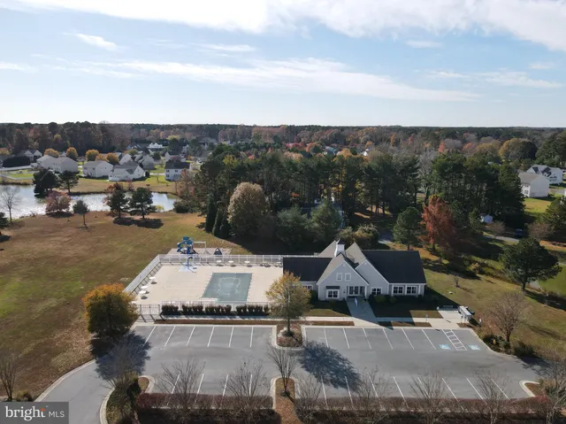 an aerial view of residential building with ocean view