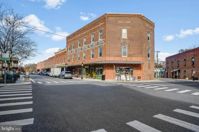 a front view of a building with street view