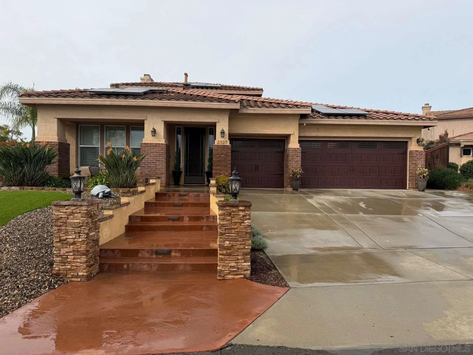 a view of a house with a patio