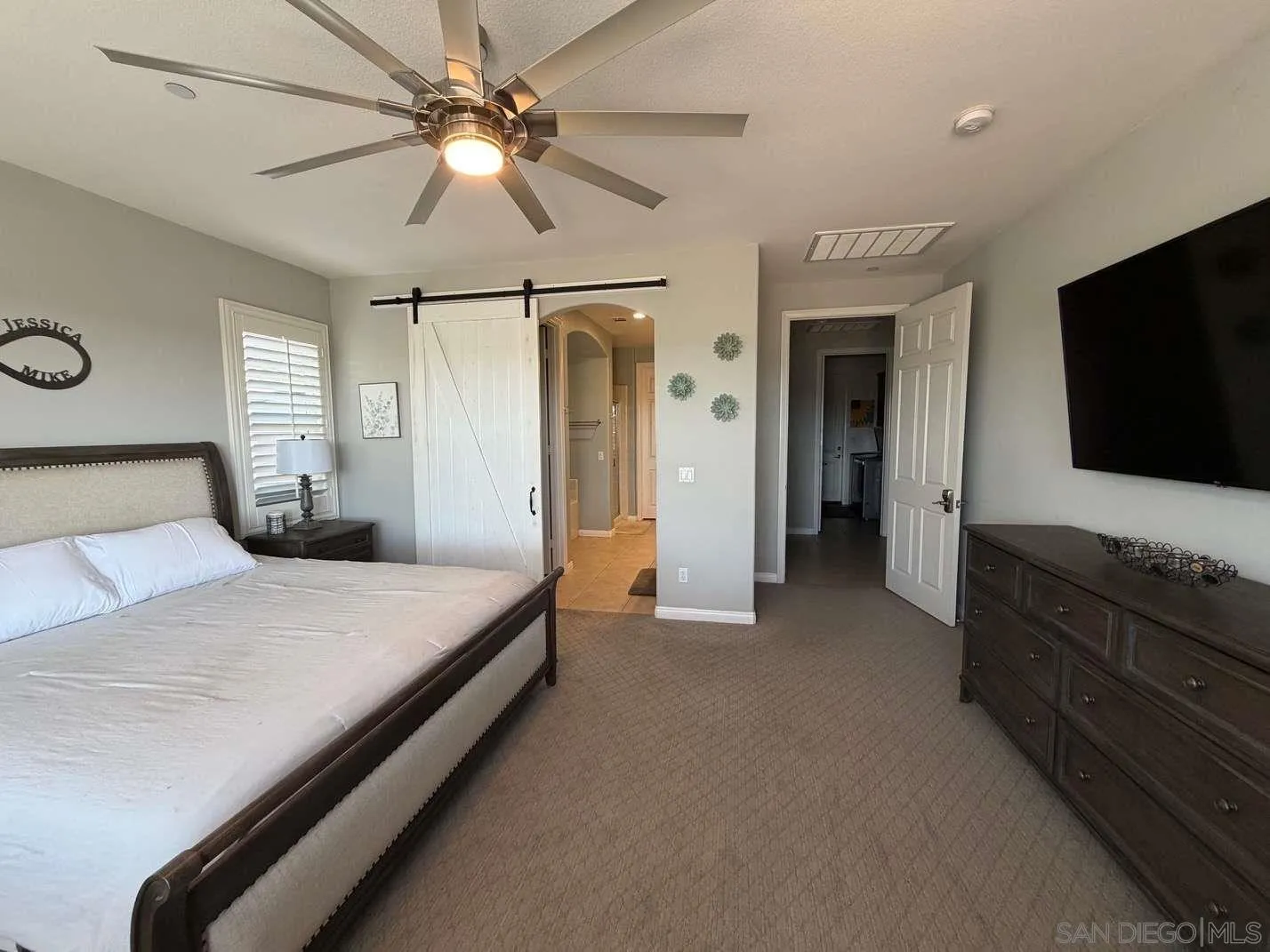 2327 Clearcrest Lane Fallbrook, CA 92028 - Photo 11 of 28 a bedroom with a bed and a flat screen tv