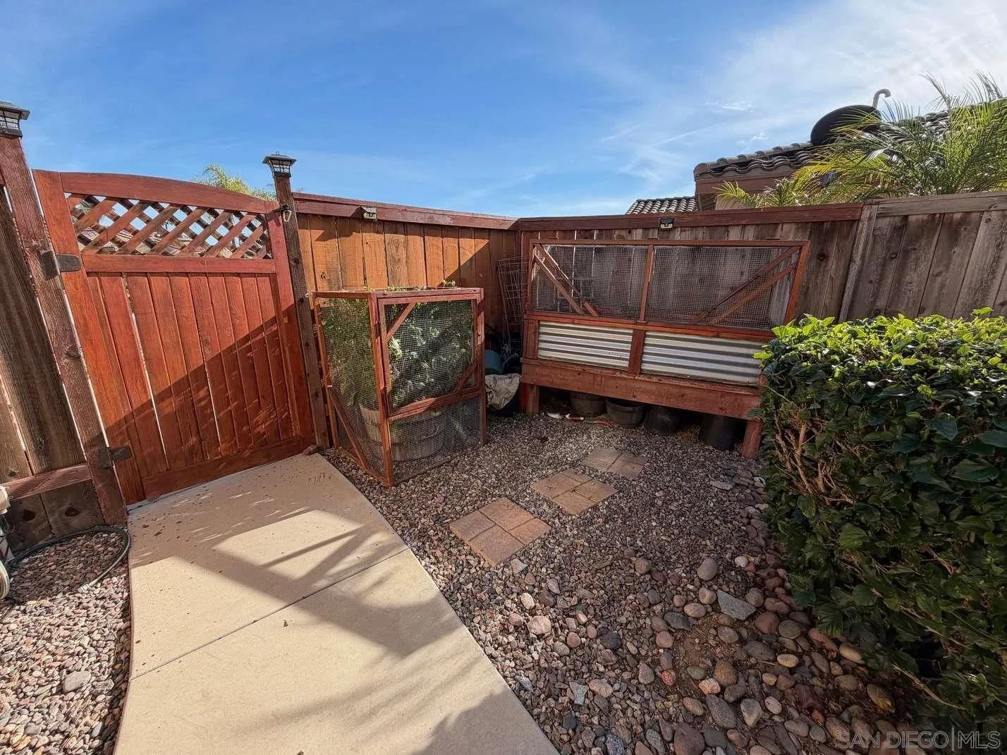 2327 Clearcrest Lane Fallbrook, CA 92028 - Photo 23 of 28 a view of a backyard with a swing
