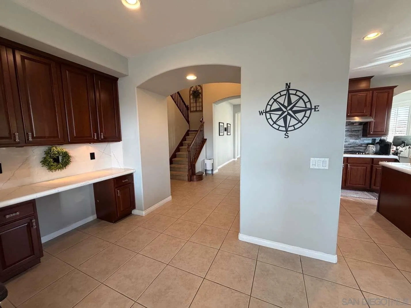 2327 Clearcrest Lane Fallbrook, CA 92028 - Photo 7 of 28 a kitchen with stainless steel appliances a refrigerator and a stove top oven