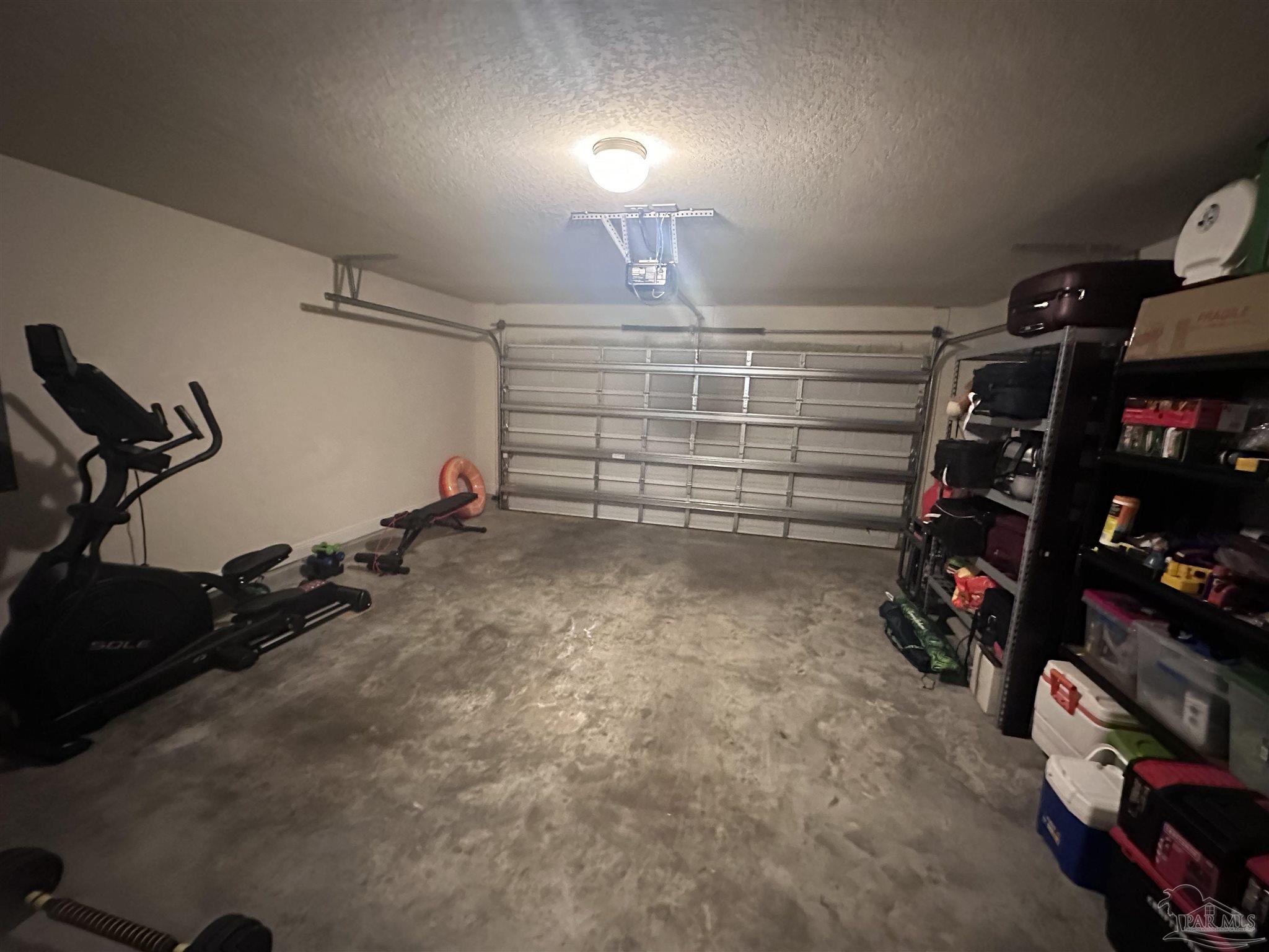 5217 Saufley Field Road Pensacola, FL 32526 - Photo 14 of 26 a view of a room with gym equipment
