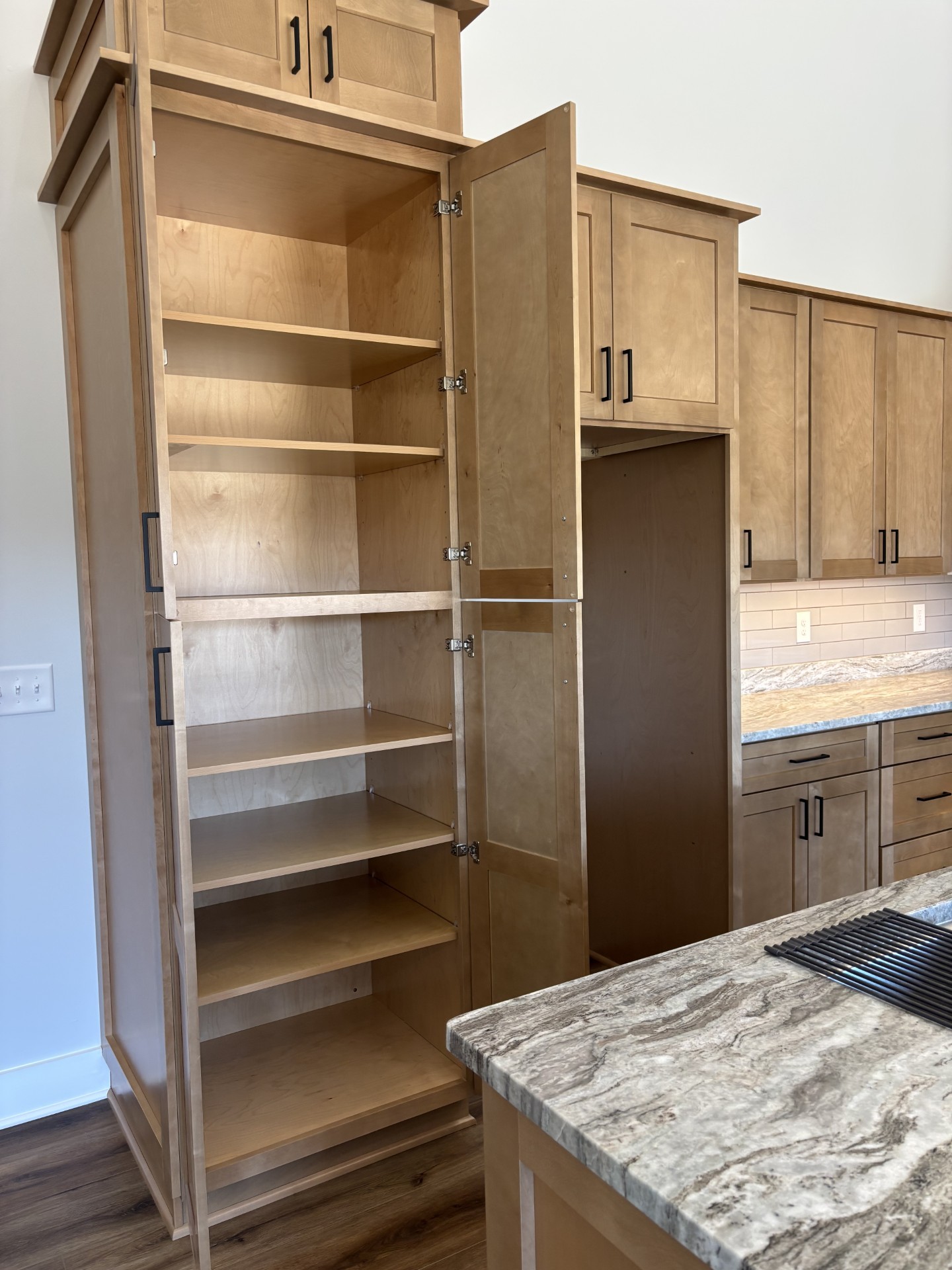 8184 Aedc Road Estill Springs, TN 37330 - Photo 20 of 43 a kitchen with a refrigerator and a sink
