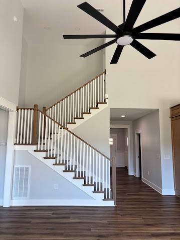 8184 Aedc Road Estill Springs, TN 37330 - Photo 23 of 43 a view of staircase with wooden floor and a fan