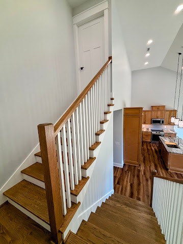 8184 Aedc Road Estill Springs, TN 37330 - Photo 26 of 43 a view of a hallway with wooden floor and staircase