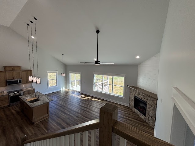 8184 Aedc Road Estill Springs, TN 37330 - Photo 27 of 43 a living room with furniture fireplace and wooden floor