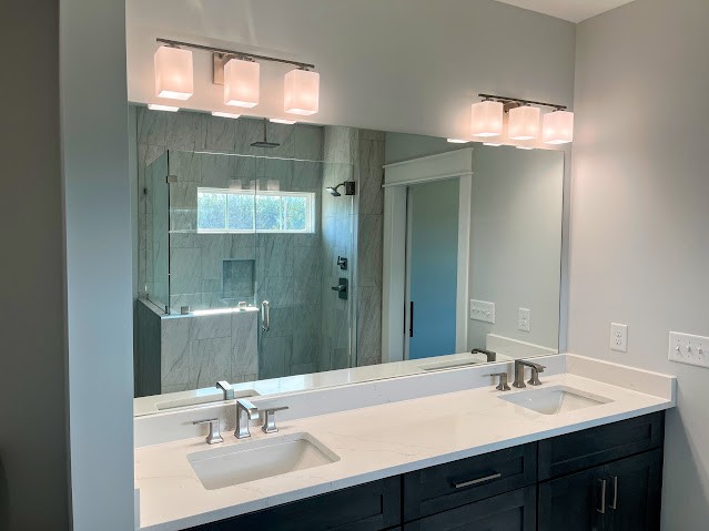 8184 Aedc Road Estill Springs, TN 37330 - Photo 30 of 43 a bathroom with a sink and a mirror