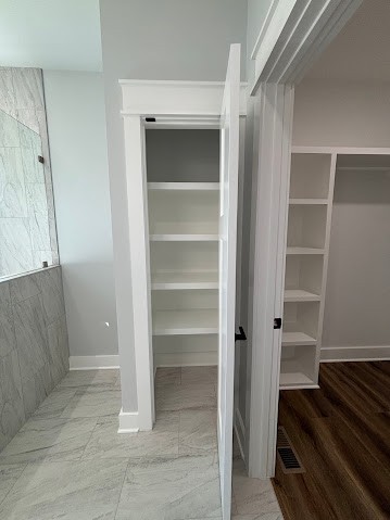 8184 Aedc Road Estill Springs, TN 37330 - Photo 34 of 43 a view of an empty walk in closet