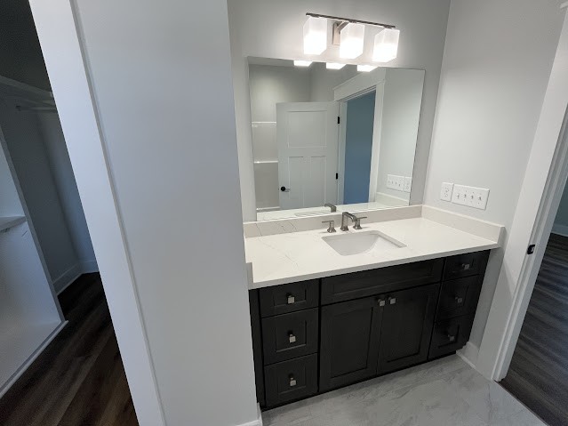 8184 Aedc Road Estill Springs, TN 37330 - Photo 36 of 43 a bathroom with a sink and a mirror