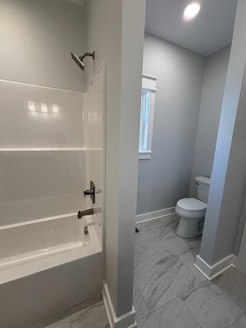 8184 Aedc Road Estill Springs, TN 37330 - Photo 37 of 43 a bathroom with a toilet and a bathtub