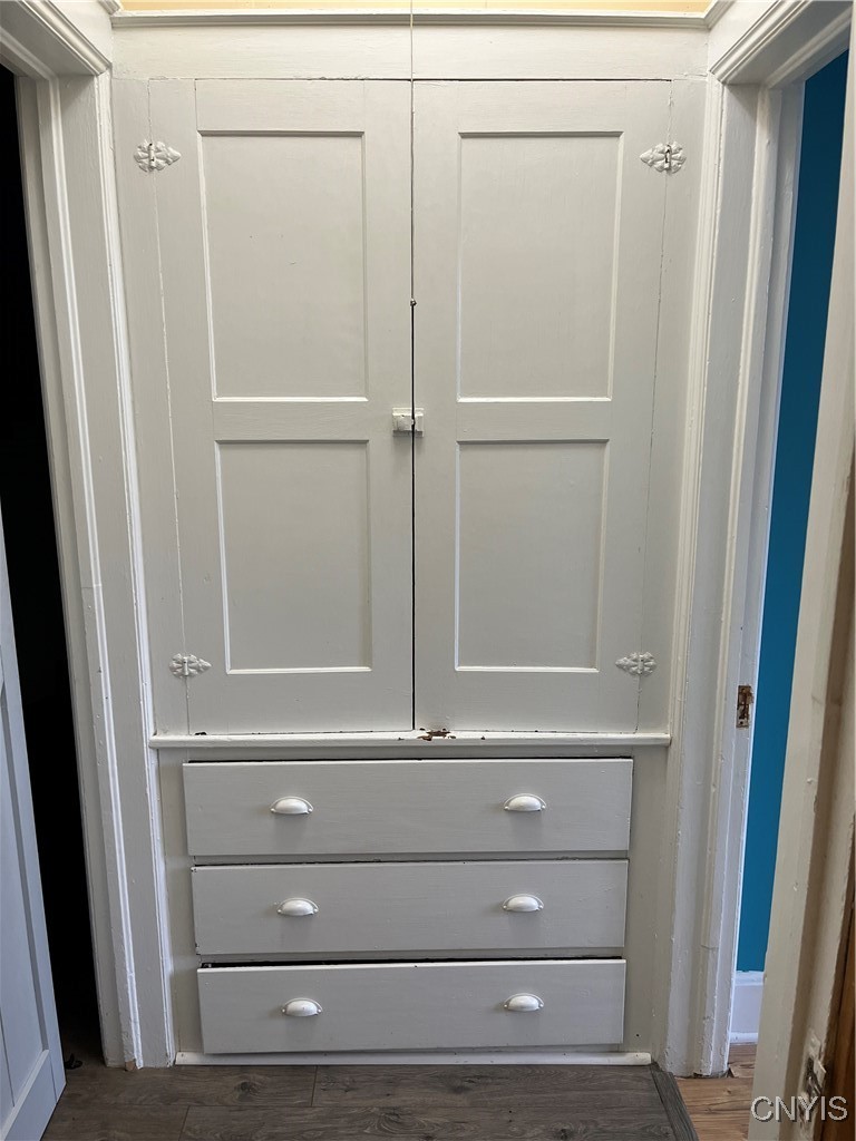 19 Genesee Court, Unit 19 Utica, NY 13502 - Photo 18 of 30 Upstairs Hall Built-in